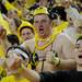 A Michigan fan shows a little skin as he dances with the Maize Rage during a taping of ESPN's College Game Day at Crisler Arena on Saturday morning. Melanie Maxwell I AnnArbor.com